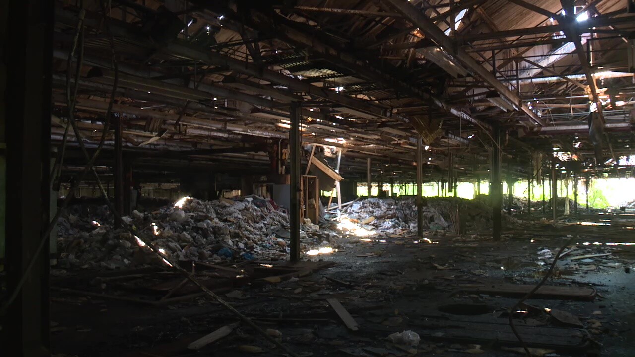 Piles of trash rot inside the old National Acme factory on Cleveland's East Side.