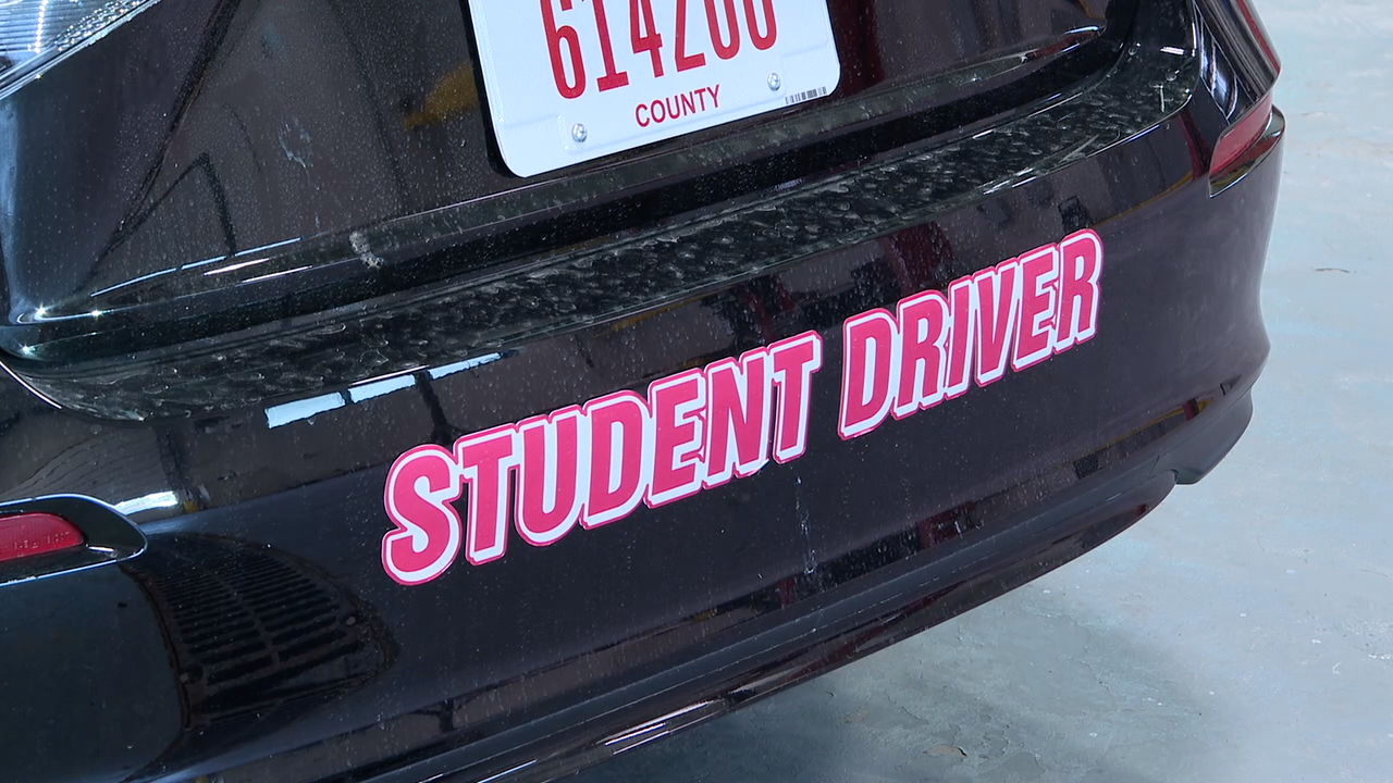Student driver sticker on vehicle 