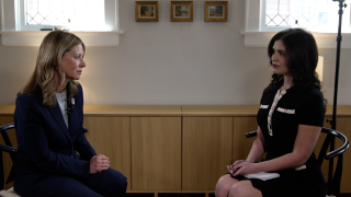 DR. AMY ACTON AND REPORTER MORGAN TRAU.png