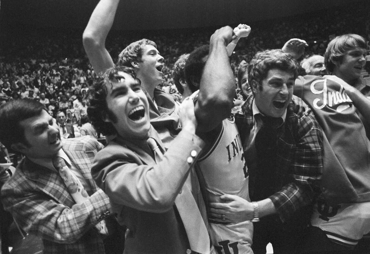 Indiana Hoosiers and basketball coach Bob Knight celebrate after NCAA tournament win in 1976