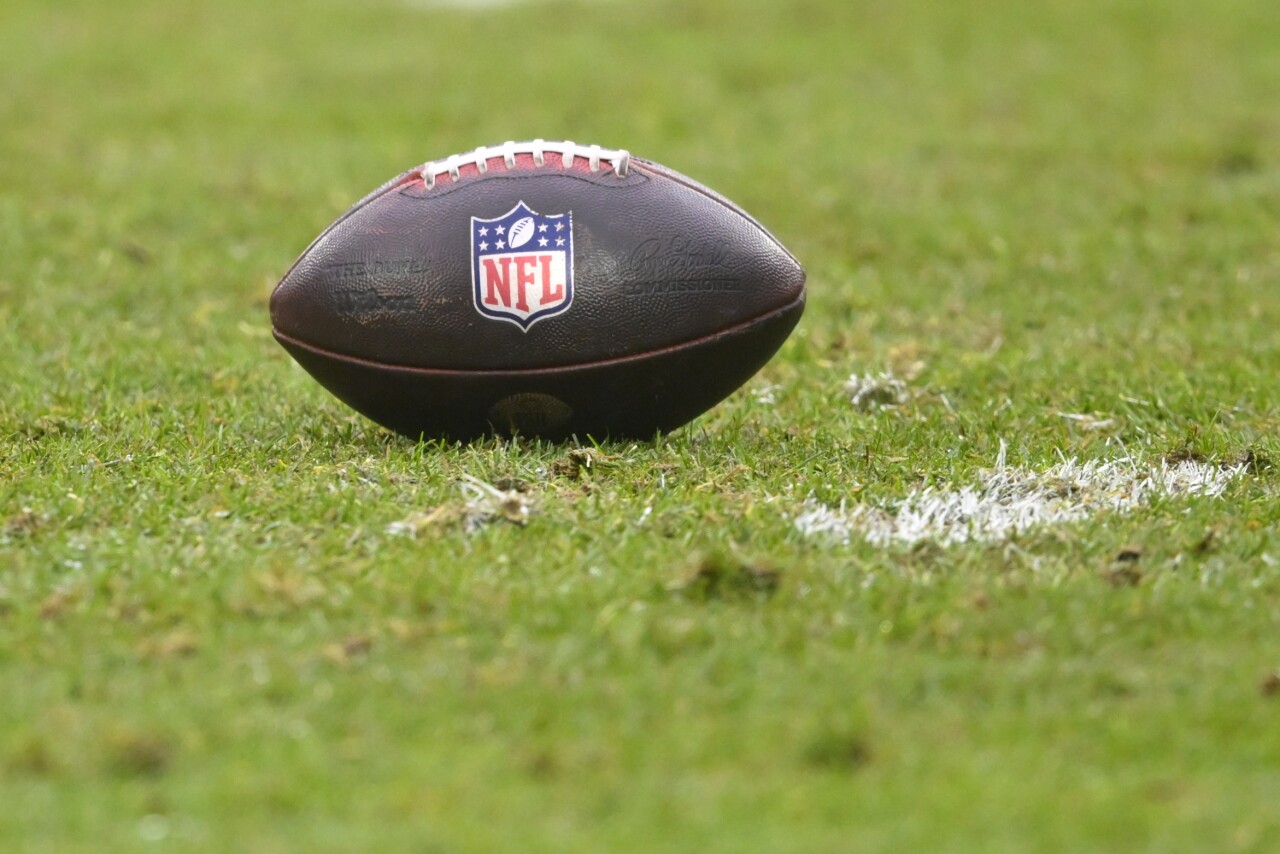 NFL football on field during game, Dec. 30, 2023