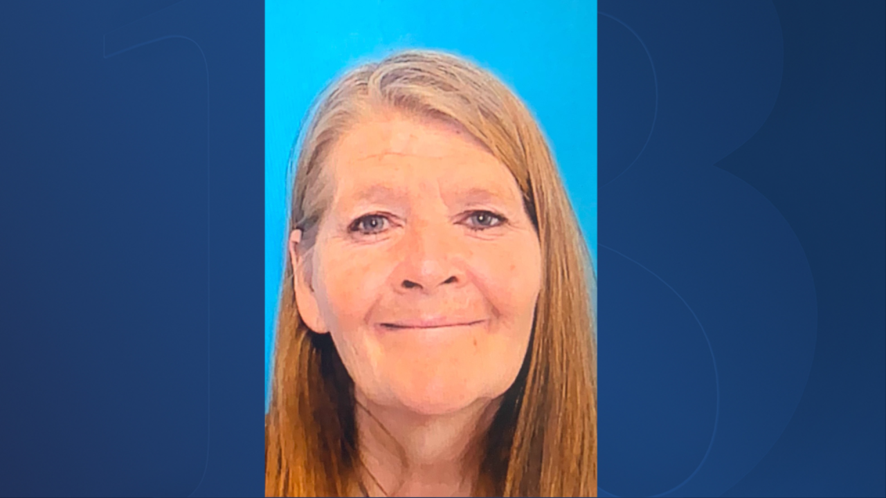 A driver license photo of 59 year-old Amy Anderson. She has light brown hair and blue eyes.