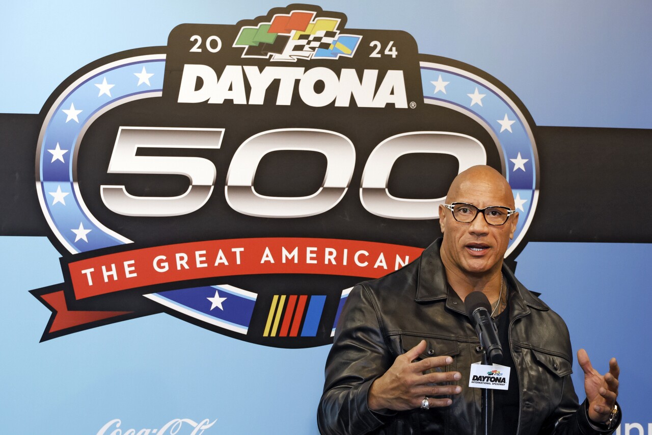 Dwayne 'The Rock' Johnson speaks during Daytona 500 news conference, Feb. 18, 2024