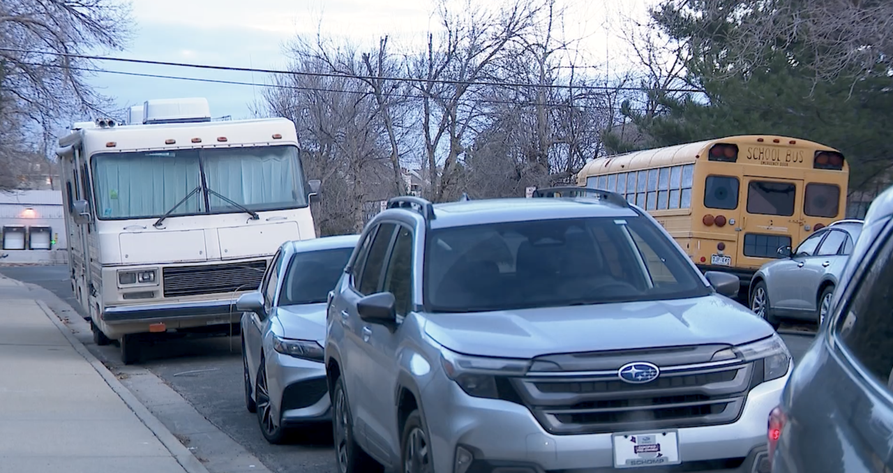 RV and school bus parked along Burbank Street in February.