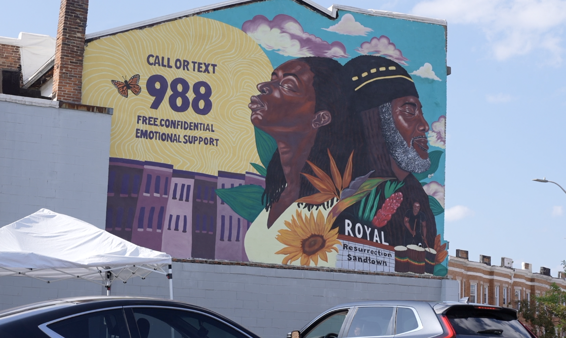 A full look at the 988 mural on Pennsylvania Avenue