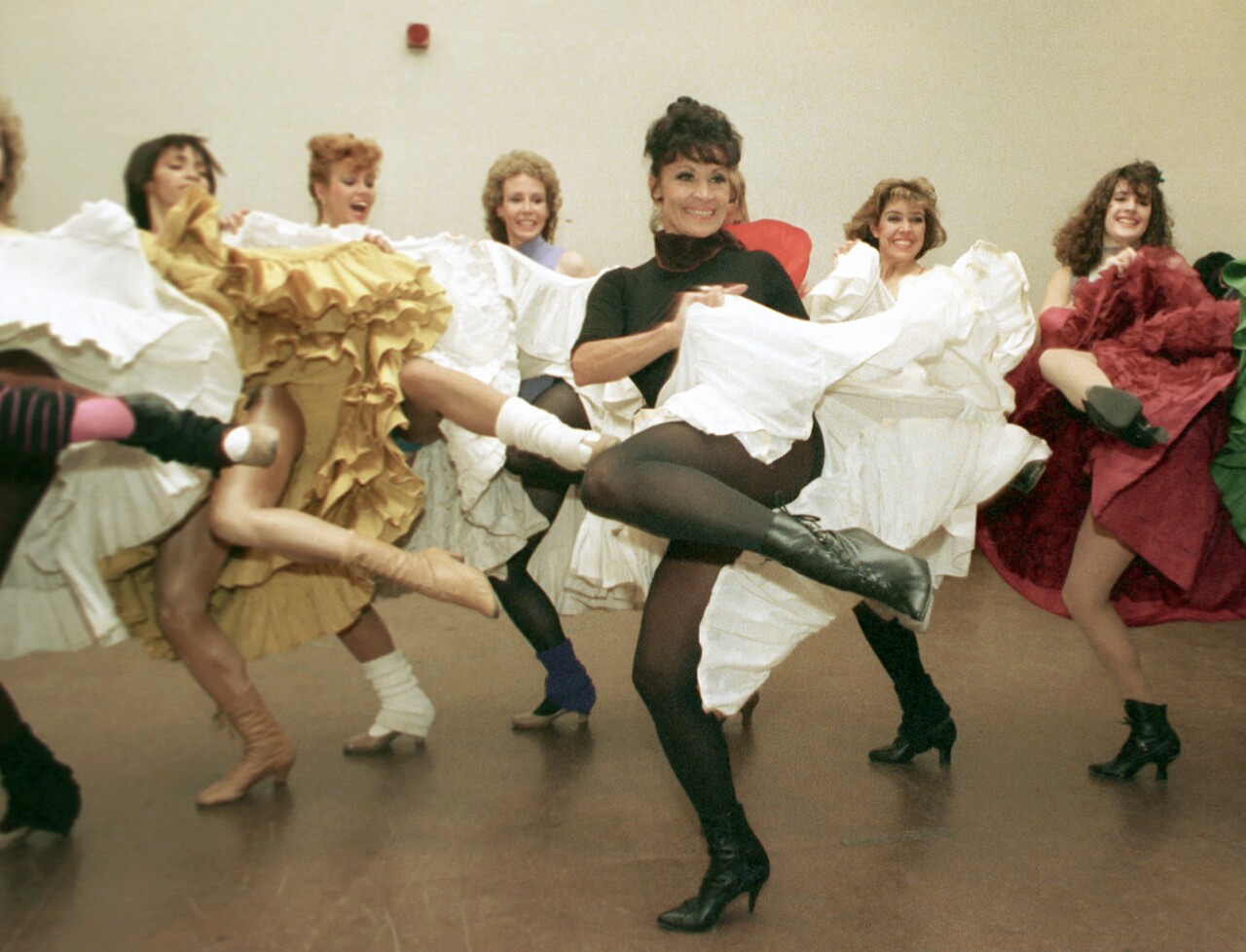 Chita Rivera rehearses with Radio City Music Hall Rockettes in 1988