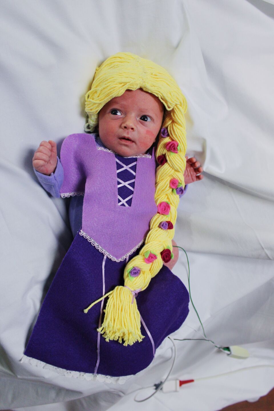 Baby in Rapunzel costume - Trinity Health Grand Rapids NICU.png