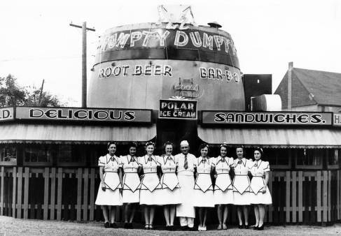 Louis_Ballast_owner_of_the_Humpty_Dumpty_Barrel_Drive_Inn_in_Denver_Colorado_poses_in_front_of_his_restaurant_during_the_1940s_with.jpg