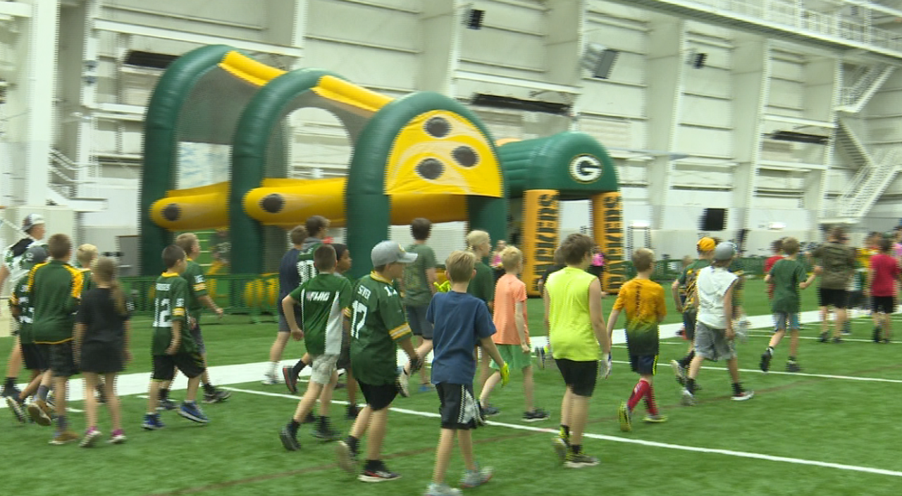 23rd Annual Junior Power Pack Kids Clinic: Packers players coach children on football skills