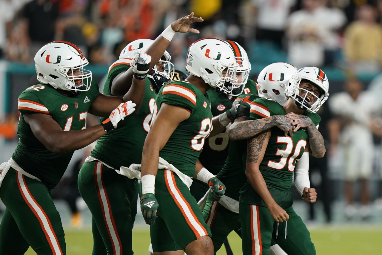 Miami Hurricanes kicker Andy Borregales celebrates with teammates after kicking game-winning FG vs. Appalachian State Mountaineers in 2021