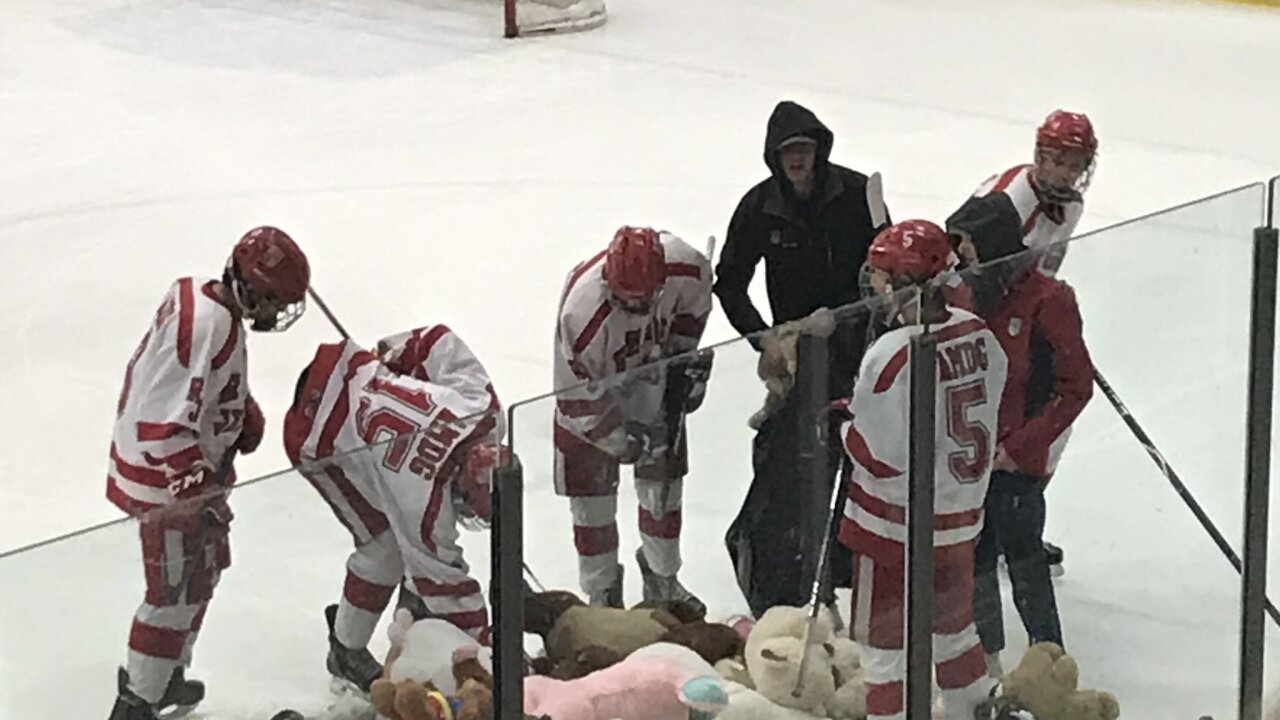 Regis Jesuit hockey - teddy bears on ice pic.jpg