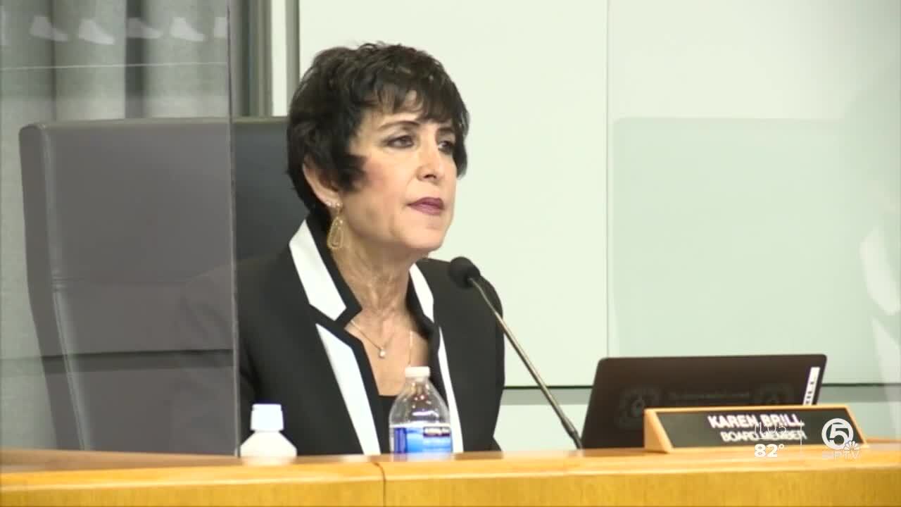 Karen Brill chides Dr. William Latson