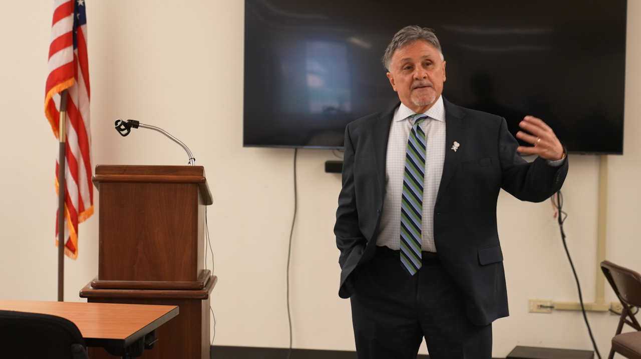 Frank DeAngelis at center.png