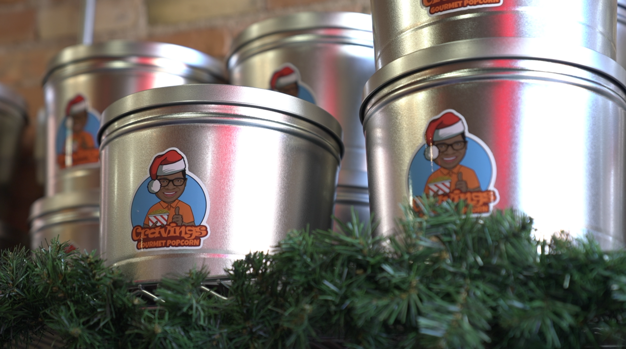 Christmas popcorn tins at Cravings Gourmet Popcorn