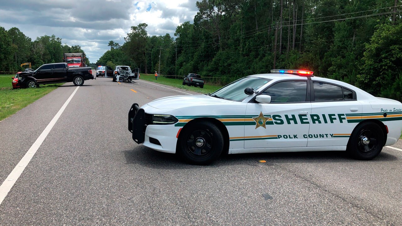 Sheriff's vehicle blocks state road 33 following a fatal crash on Tuesday, May 31, 2022, in Polk City, Fla. Bart Bryant, 59, a three-time PGA Tour winner