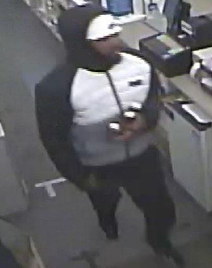 Suspect - Pharmacy robbed at gunpoint