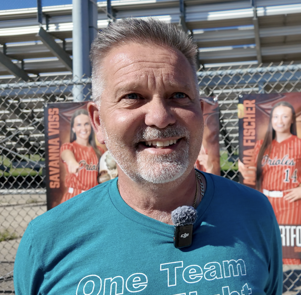 Andy Voss has twin daughters who play softball in Hartford