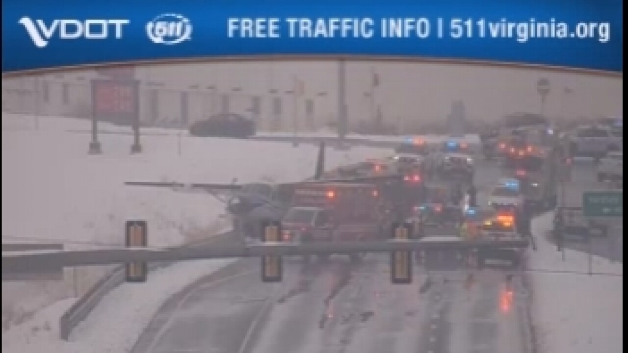 Small plane seen in a roadway, blocking all lanes in Loudoun County, Virginia.