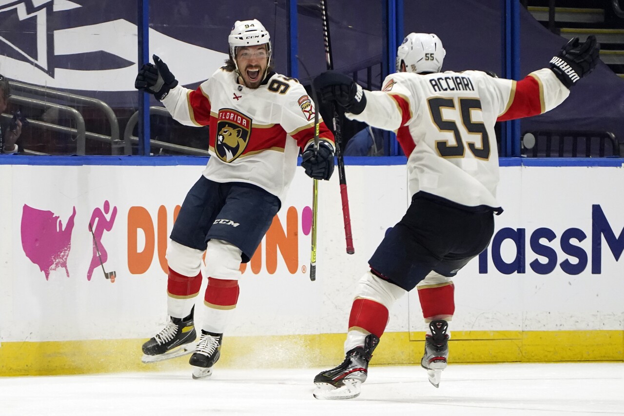 Florida Panthers left wing Ryan Lomberg celebrates with center Noel Acciari after game-winning goal in OT vs. Florida Panthers in playoffs, May 20, 2021