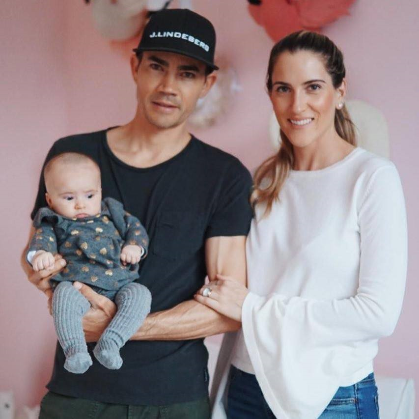 Camilo Villegas, Maria Ochoa and their daughter Mia.