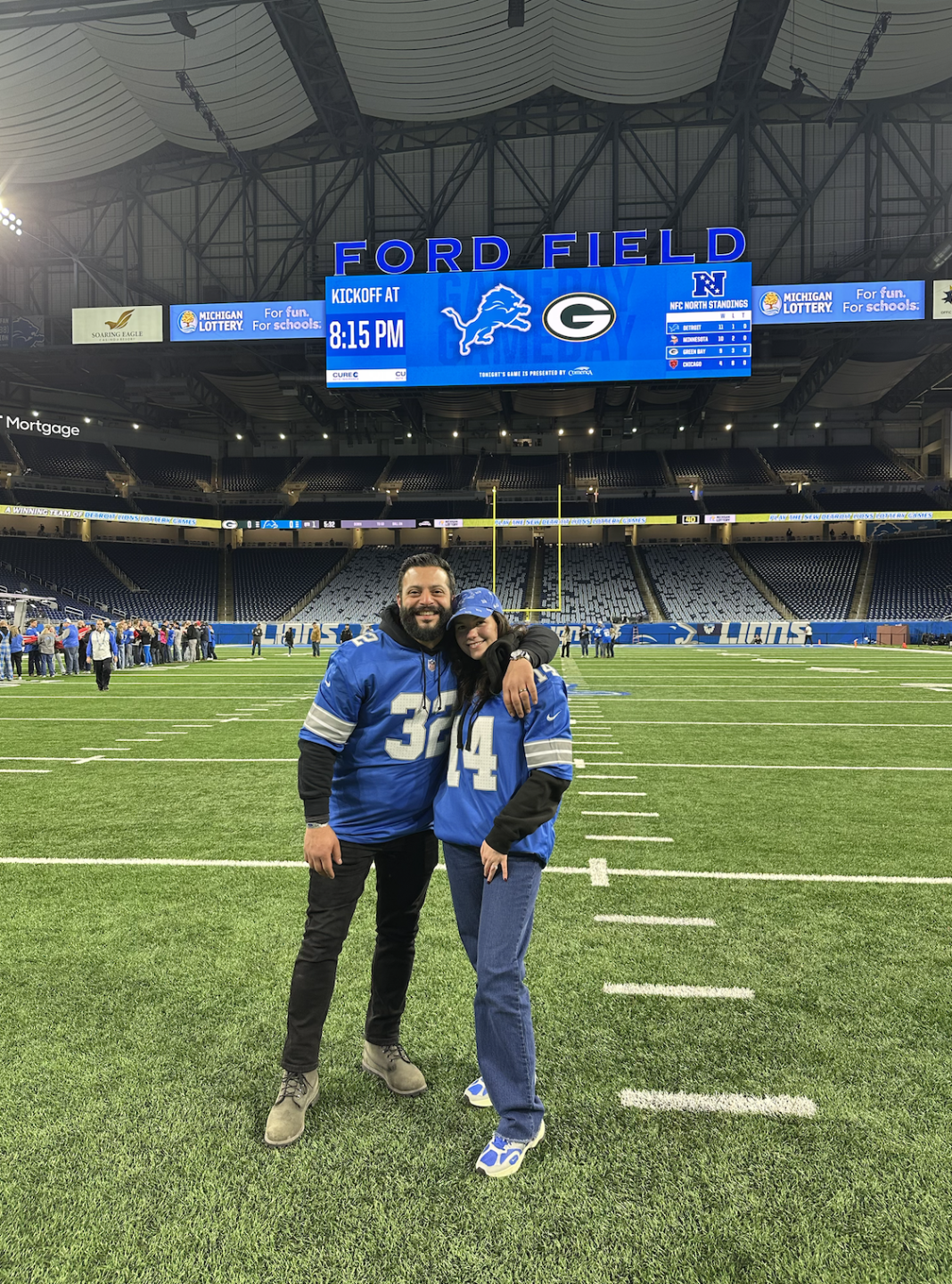 Fahad Yousif at the Lions game against the Packers at Ford Field with his wife