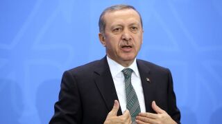 : Turkish Prime Minister Recep Tayyip Erdogan speaks to the media following talks with German Chancellor Angela Merkel at the German federal Chancellery on February 4, 2013 in Berlin, Germany.