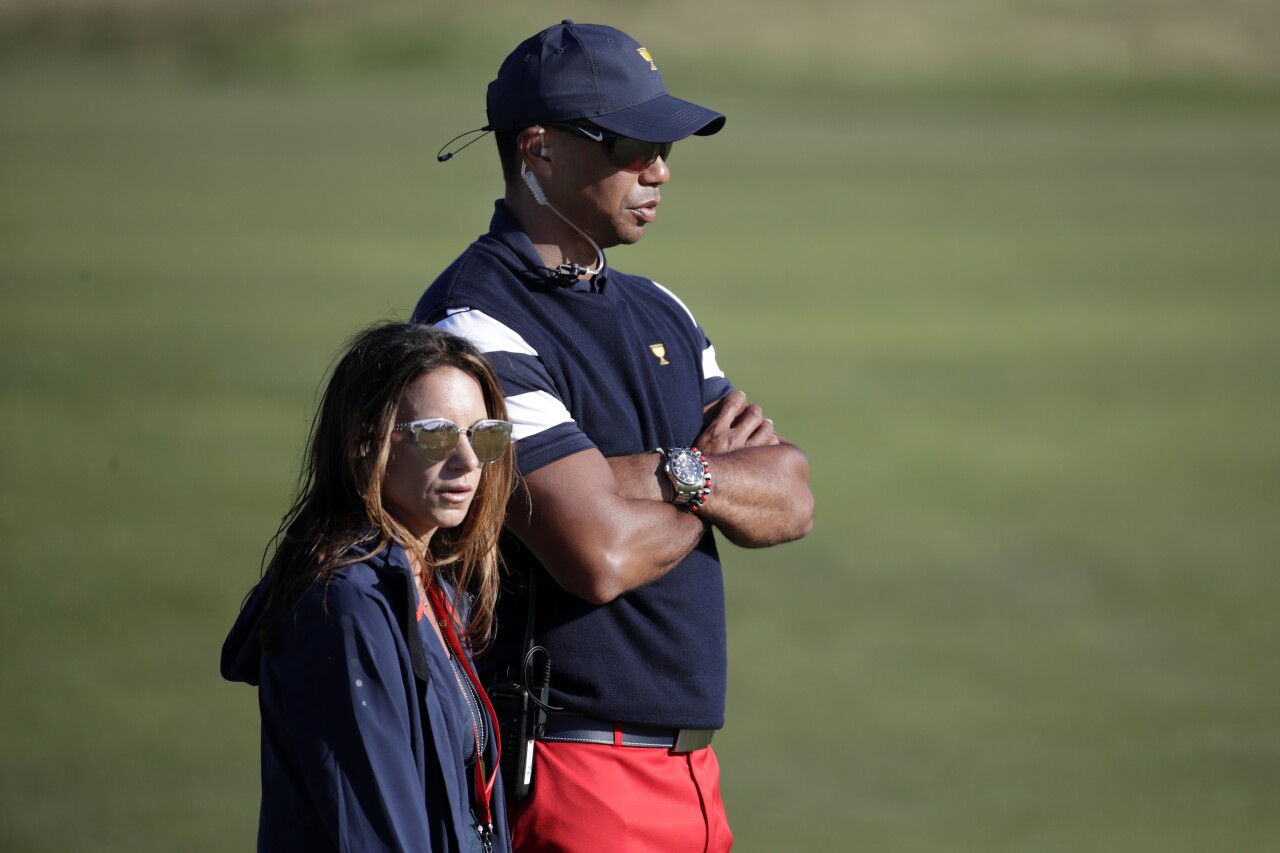 Tiger Woods with Erica Herman during final round of Presidents Cup in 2017