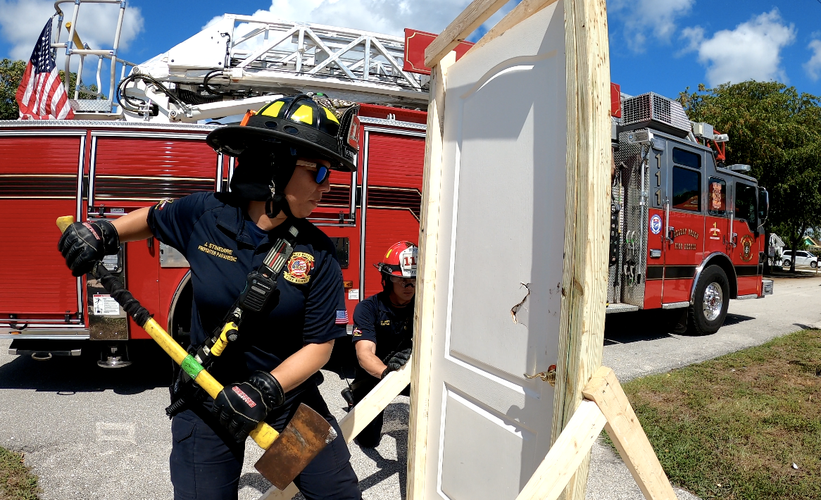 Delray Beach Fire-Rescue demonstration of firefighter breaking down door
