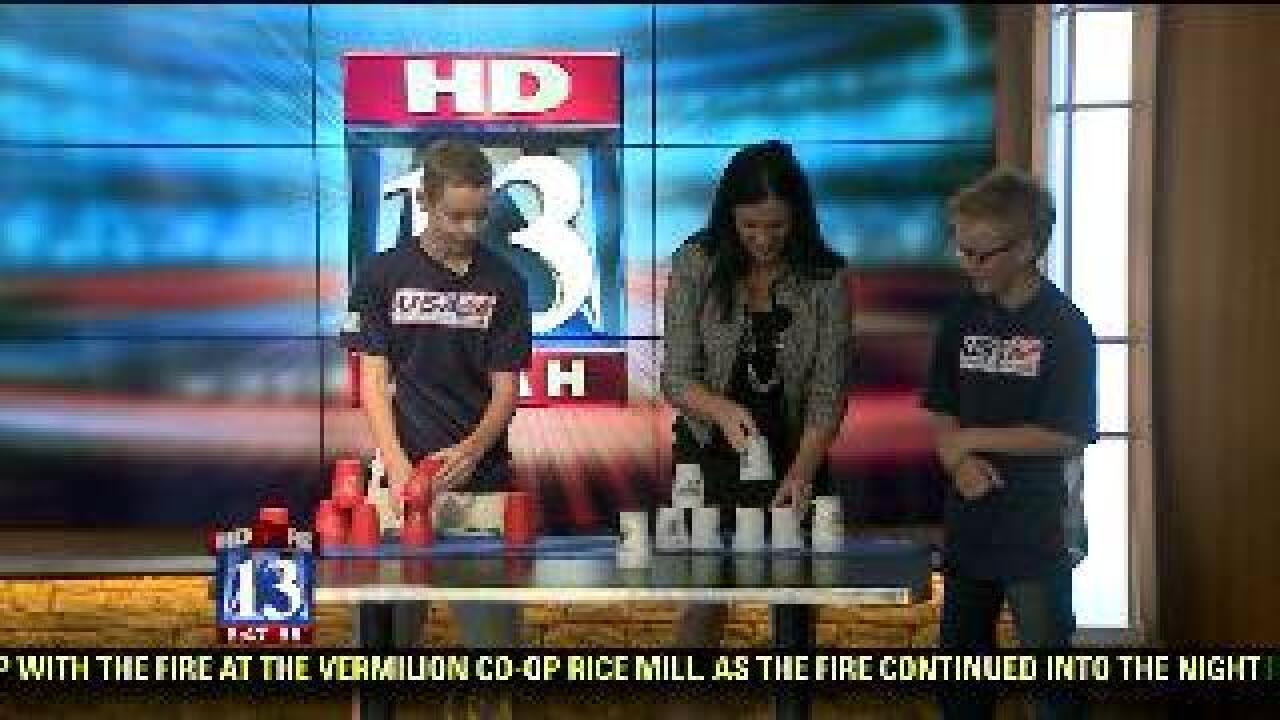 Kelly takes on cup stacking