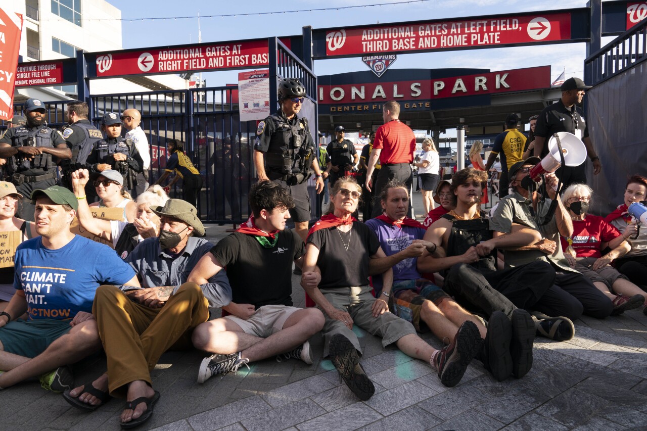 Climate activists at the 2022 congressional baseball game.