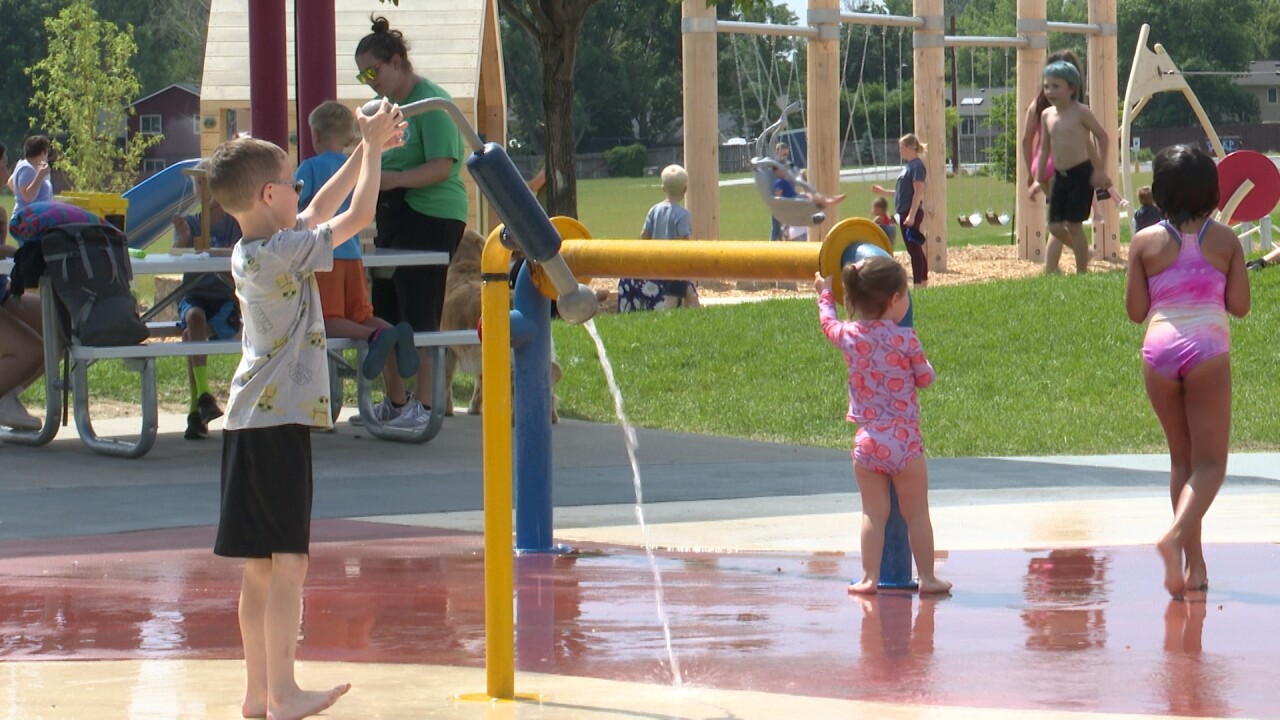 Children playing at the splash pad at Castle Rock Park