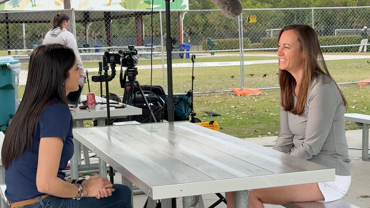 WPTV reporter Cassandra Garcia speaks to a resident during a Let's Hear It event held on Feb. 11, 2026, at North County District Park in Palm Beach Gardens.