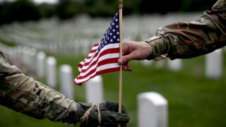 Miniature American flag at a cemetery