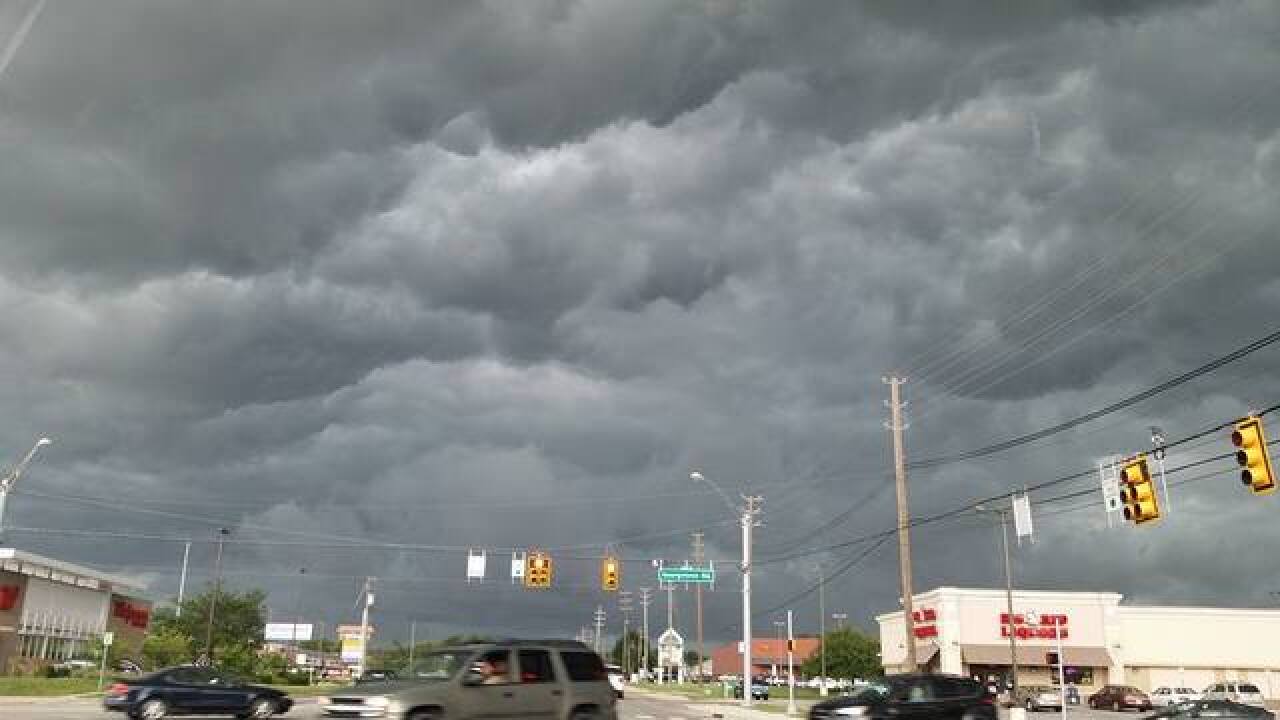 PHOTOS: Ominous skies and storm damage