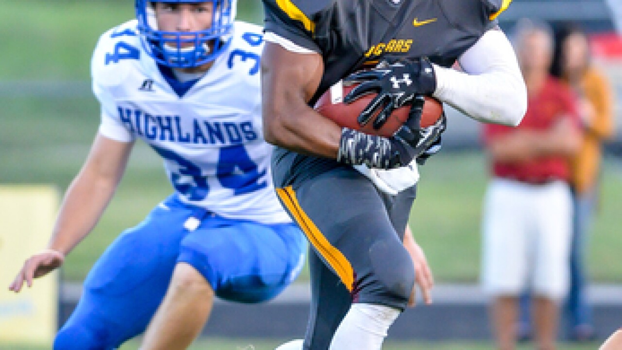 PHOTOS: Cooper shocks Highlands