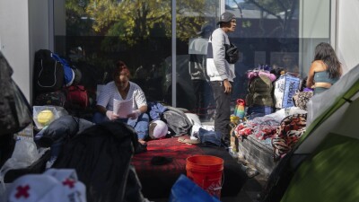 Migrants are camped outside a police station in Chicago.
