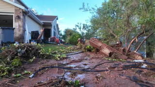 Neighbors clean up after devastating floods in Hurricane two months after previous flood