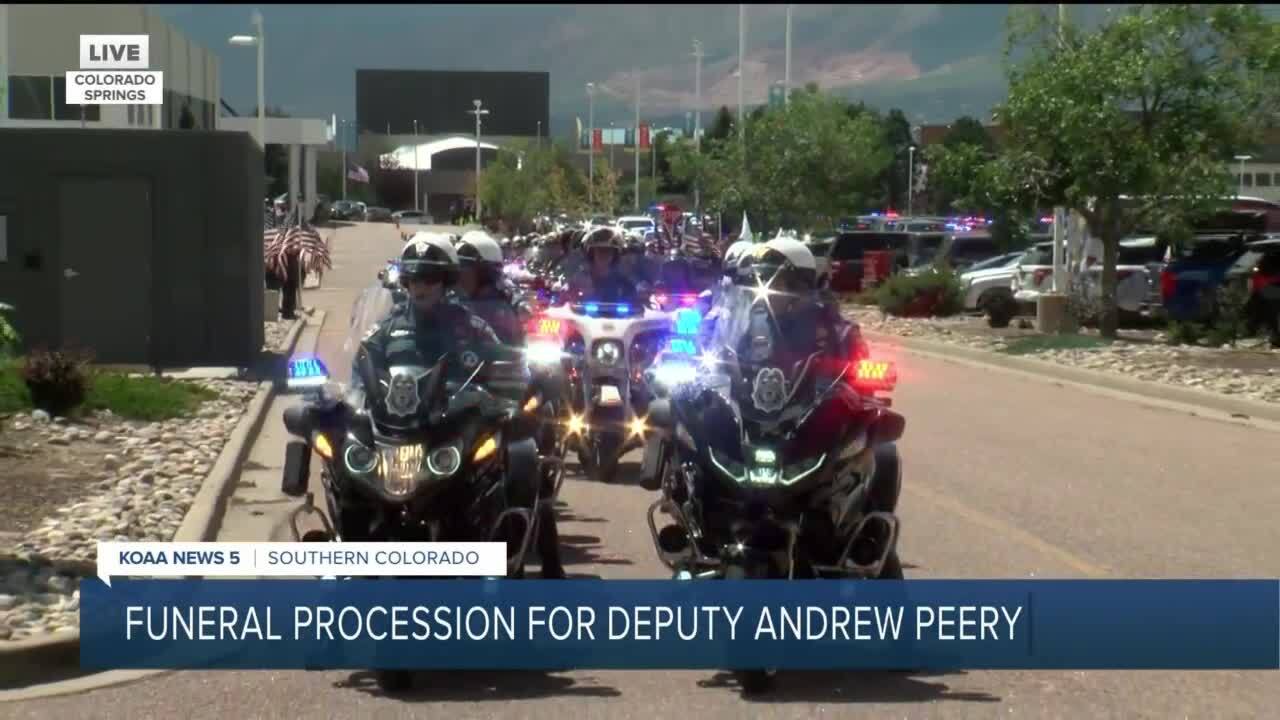 Police escort funeral procession for deputy andrew peery