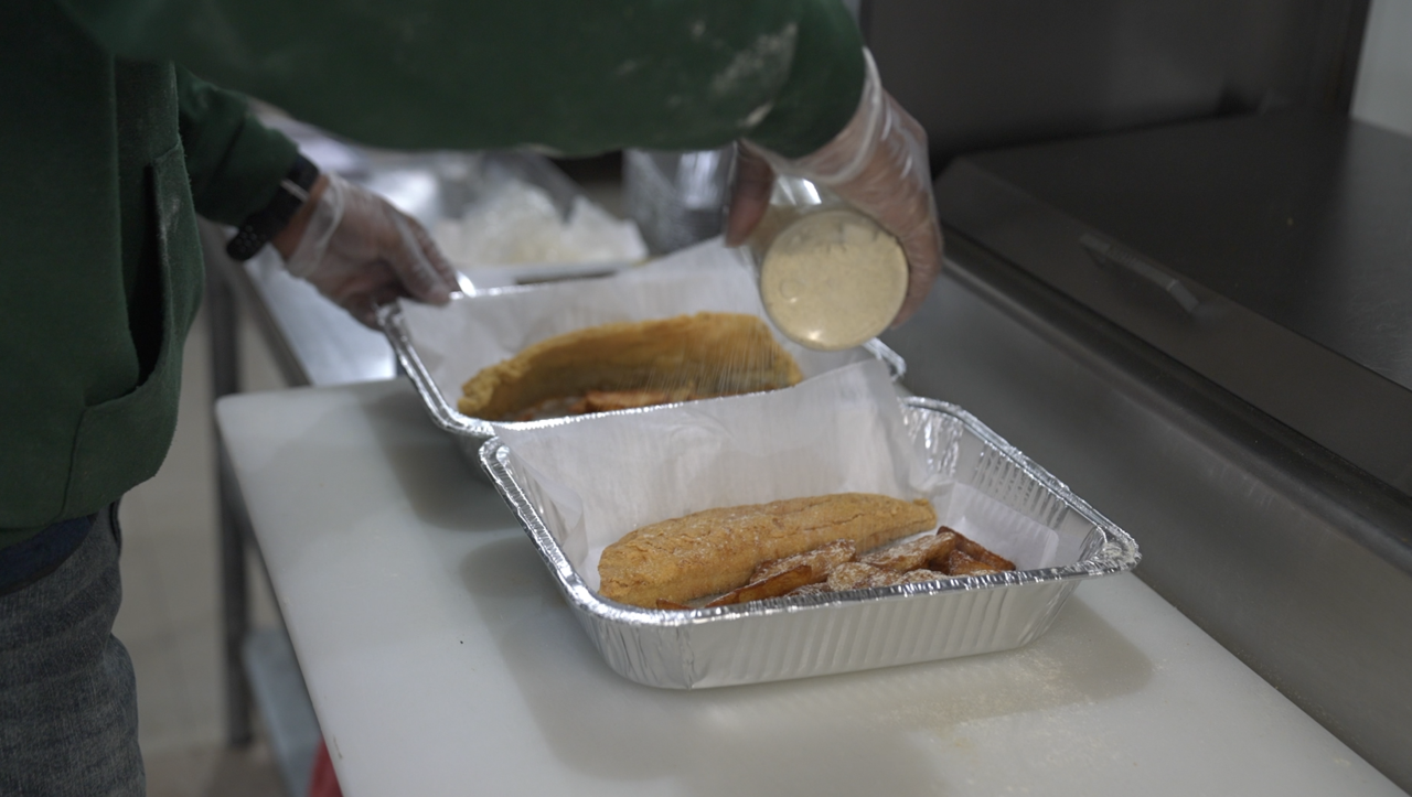 Fish fry being seasoned at Eastside Fish Fry & Grill