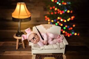 Newborn poses with BB gun replica in 'A Christmas Story' photo shoot