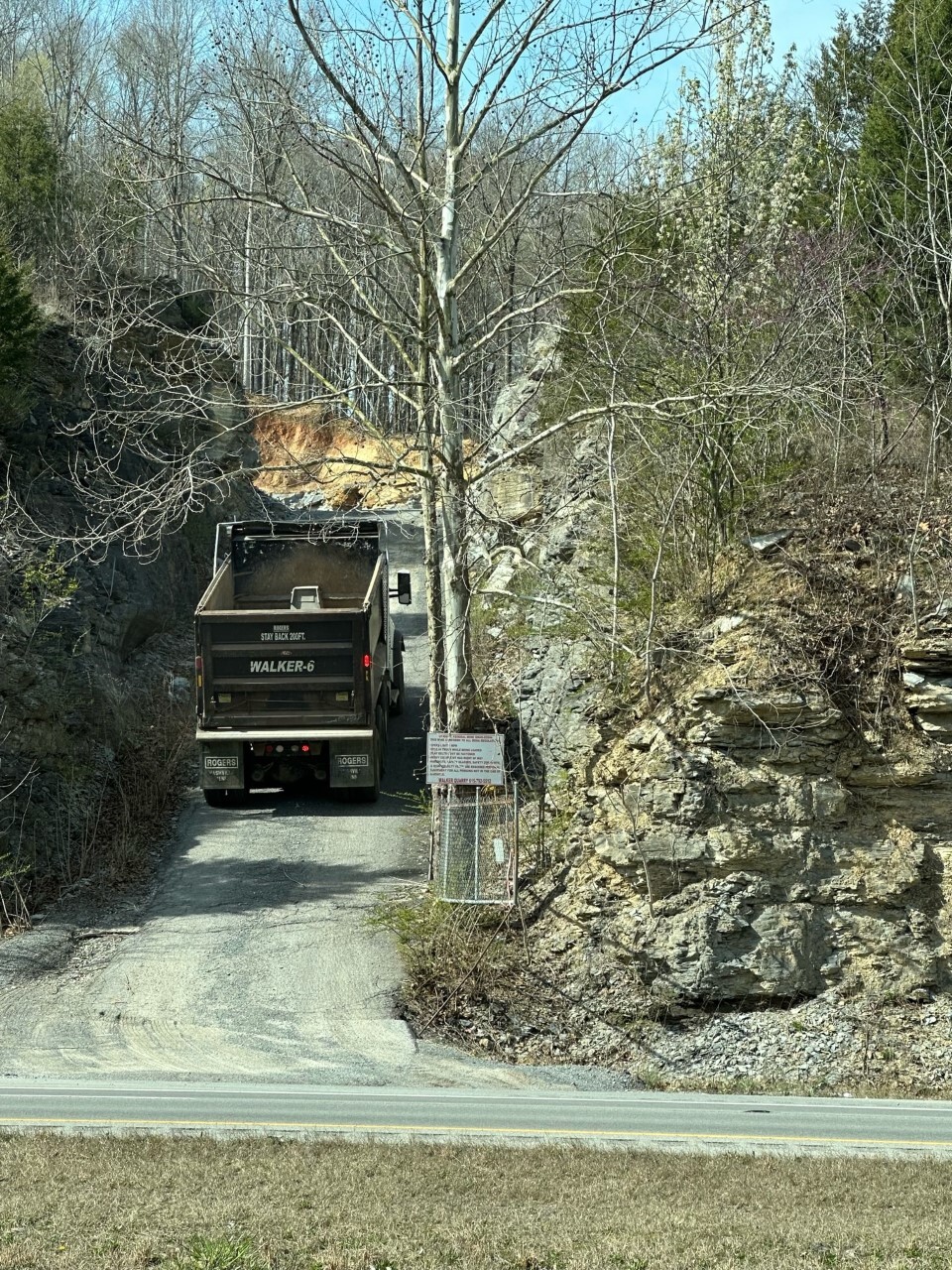 Walker truck using access road to State Route 12