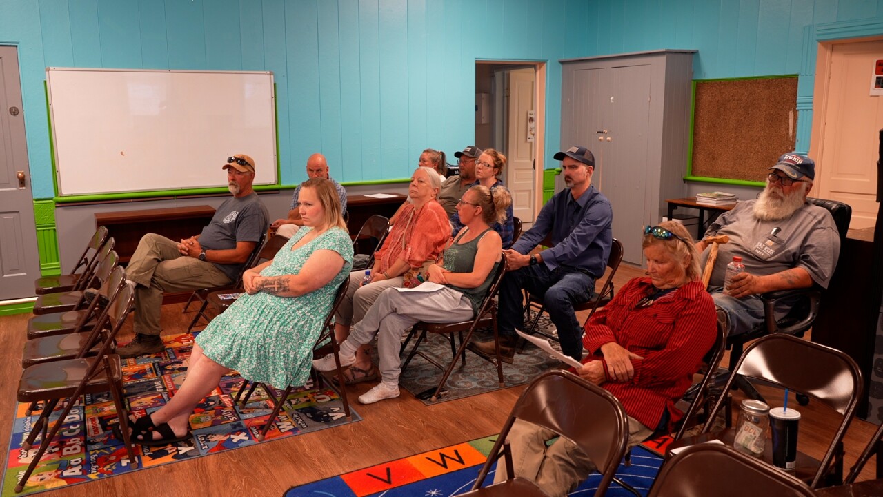 Community gathers for school board meeting