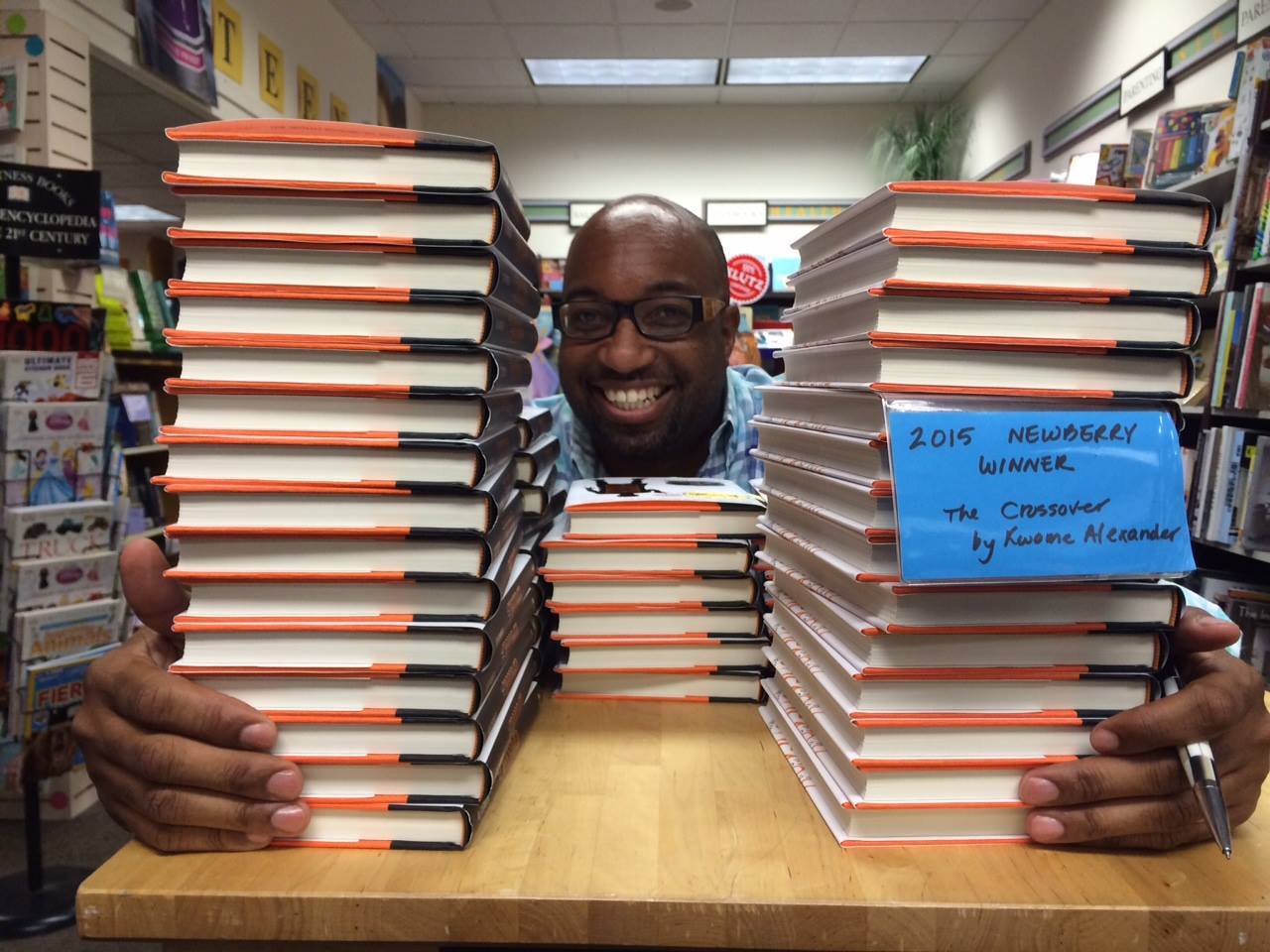 Kwame Alexander signs copies of "The Crossover"