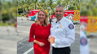 Ashley Glass connecting with Jupiter Fire Chief