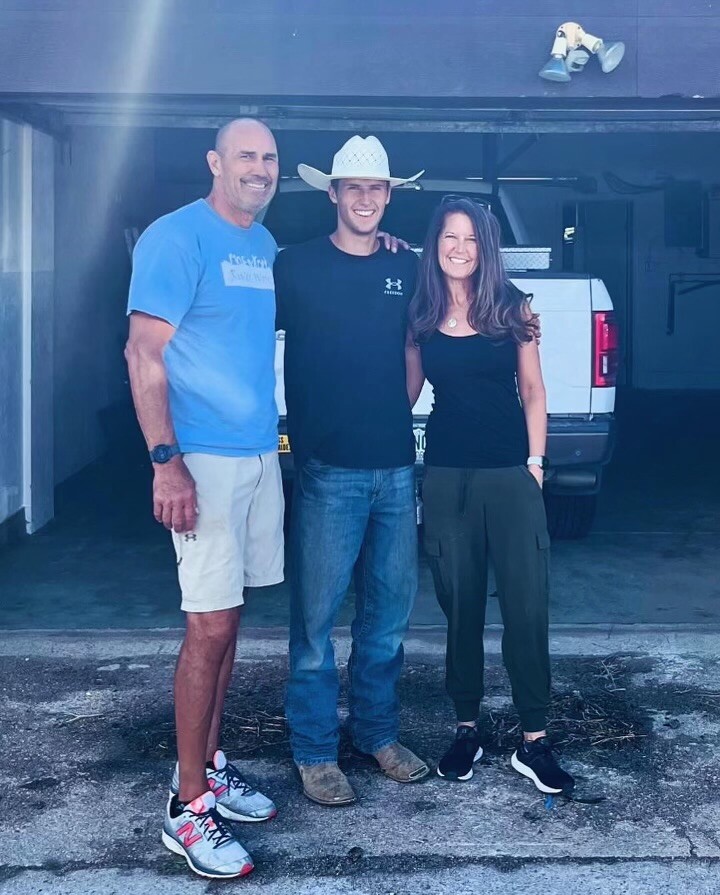 Chas Mosby with his parents the day he moved into his home in Carr.