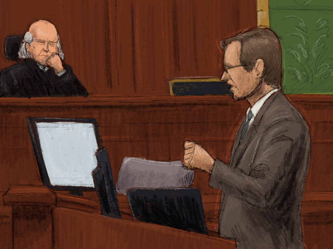 Assistant U.S. Attorney Tim Mangan argues before U.S. District Court Judge Michael Barrett.