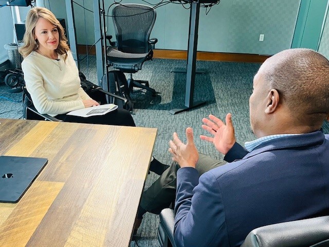Sharon talking with Monroe Nichols.jpg