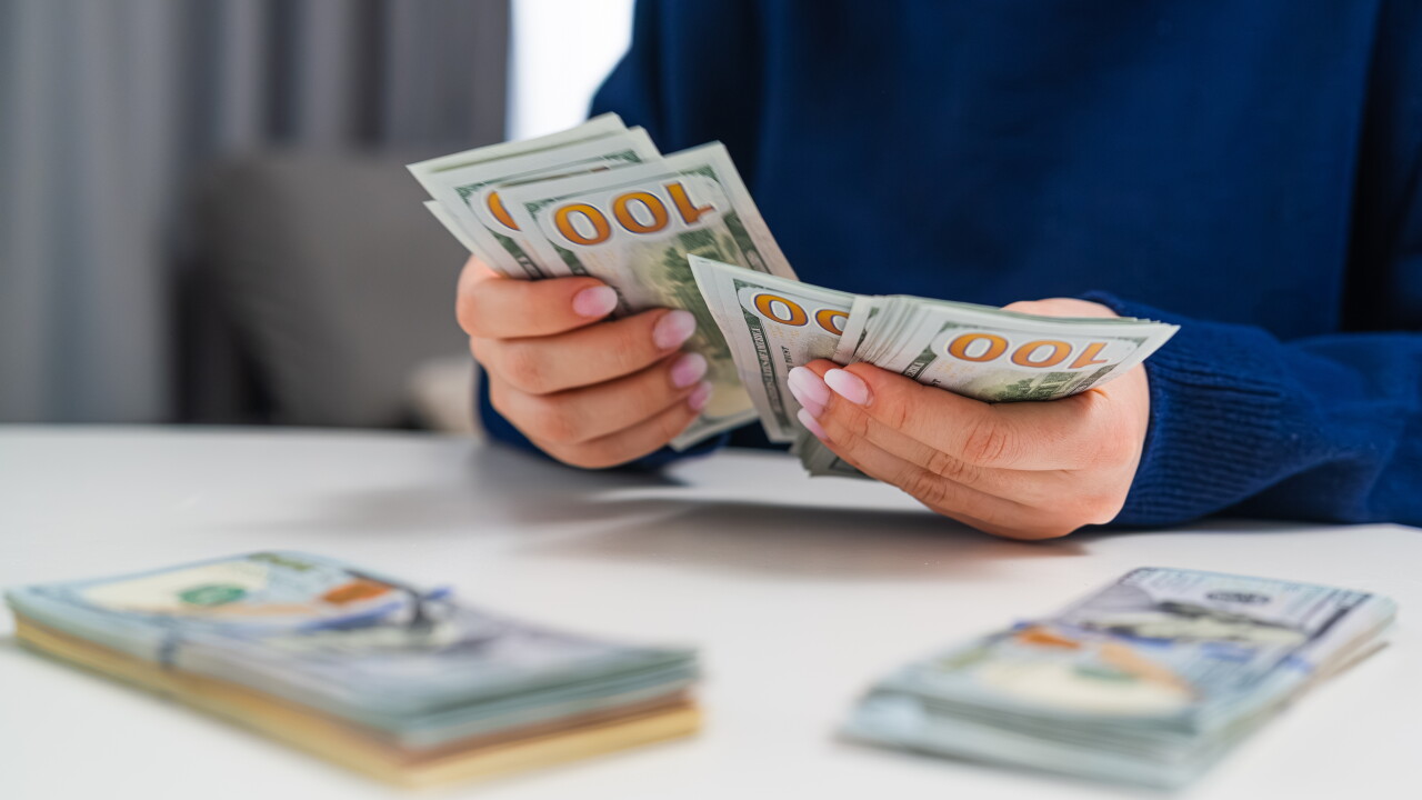 Woman counting money.