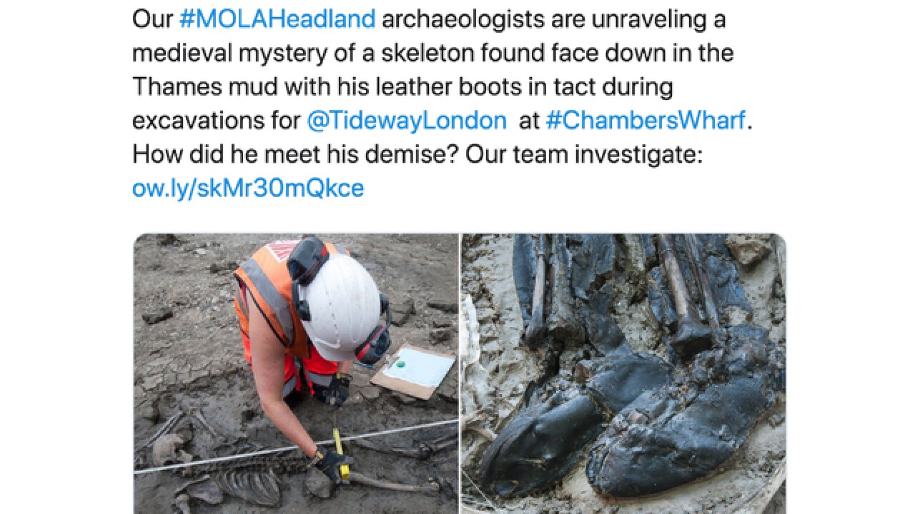 500-year-old skeleton w/thigh-high boots found