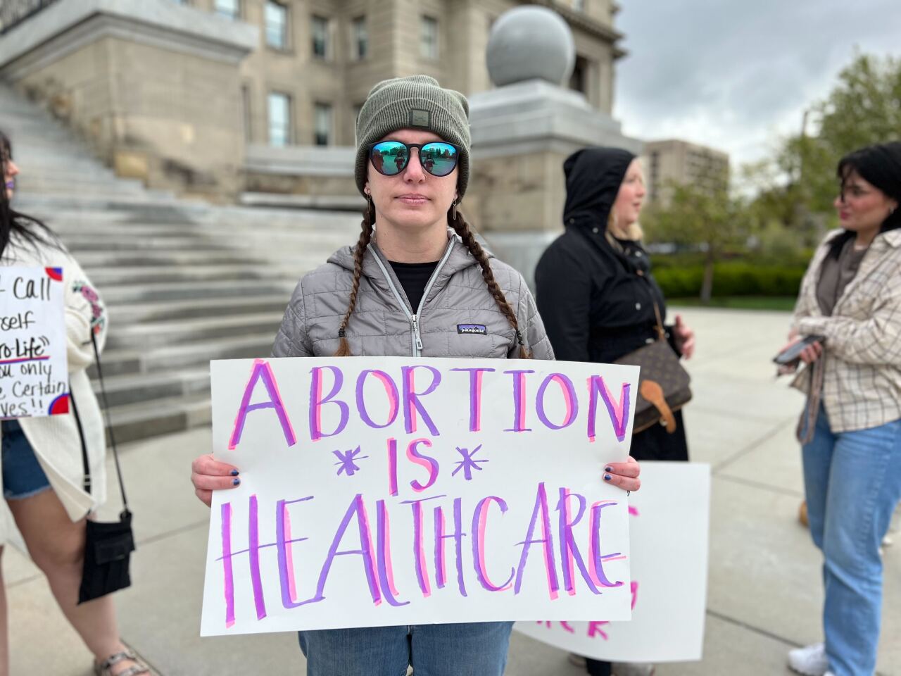 Abortion rights supporters gather at the Idaho Statehouse